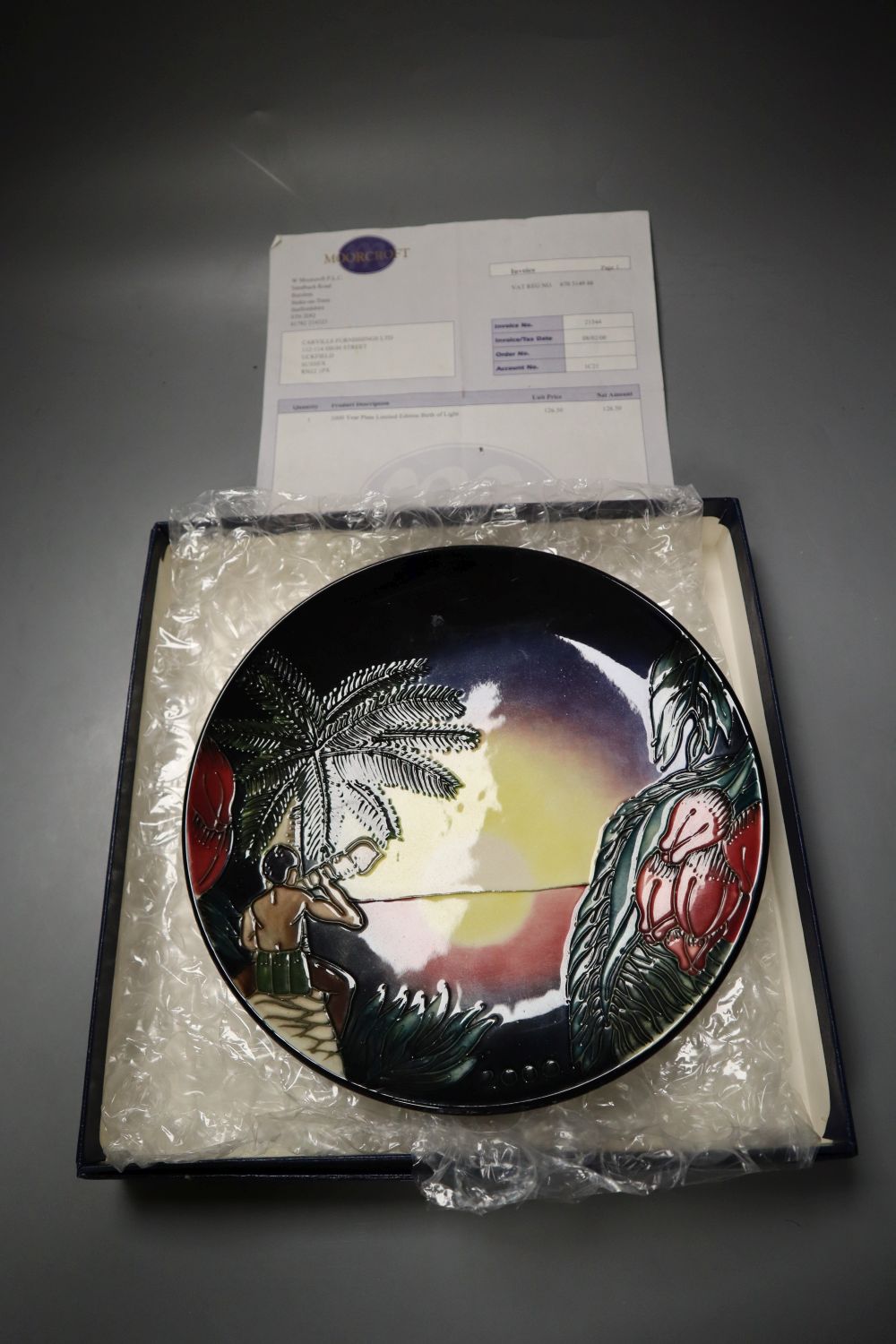 A Moorcroft 2000 year plate, Birth of Light, designed by Nicola Slaney and Wendy Mason, limited edition number 368 of 2000, 23cms d